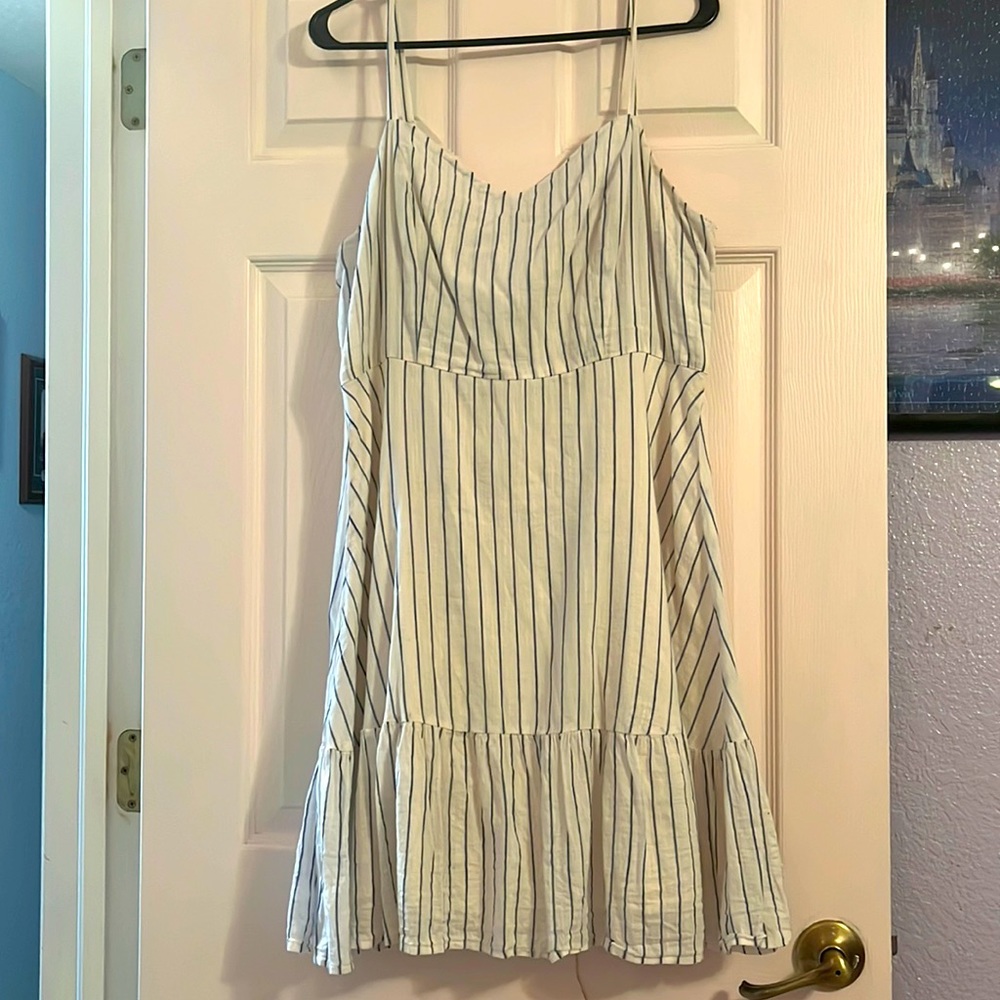 Summer mini white and blue striped dress with a light cream cami underneath